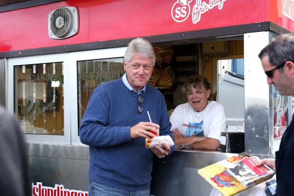 Bill Clinton enjoying his hotdog
